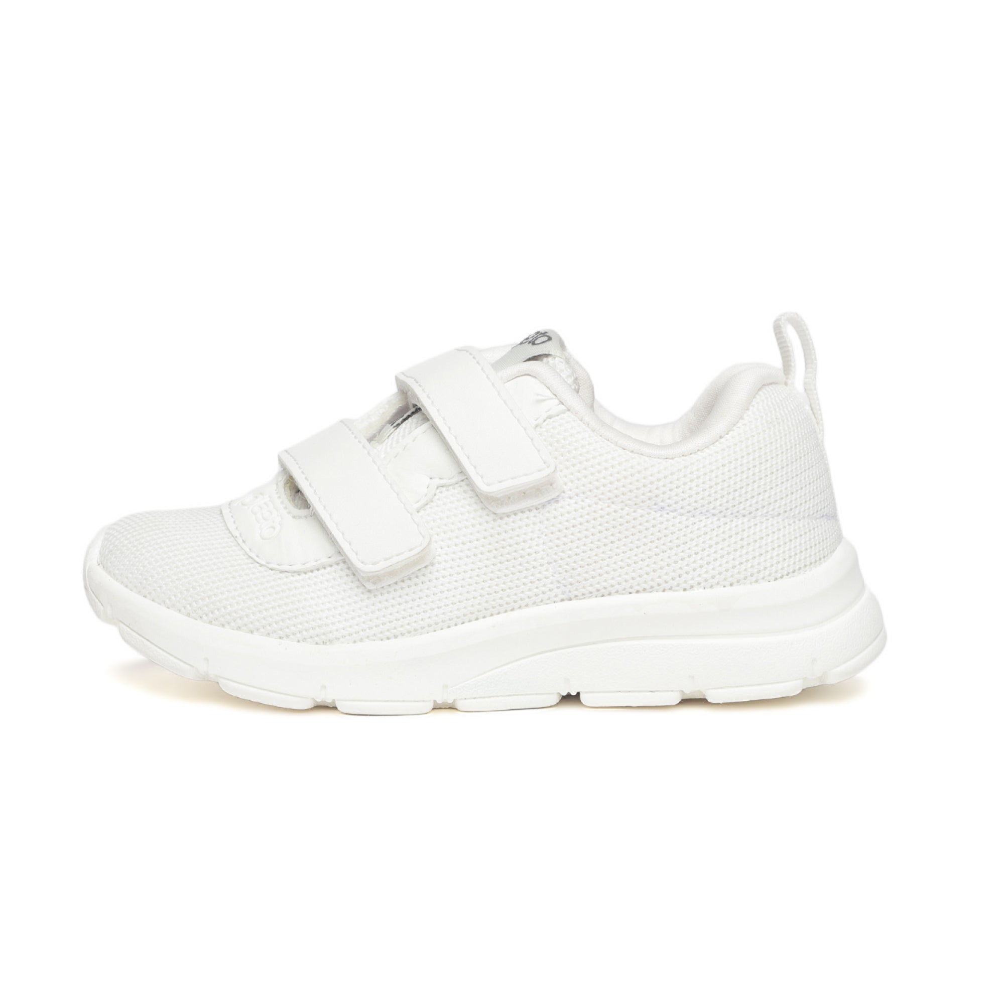 A white school shoe with hook and loop closure for children.