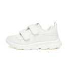 A white school shoe with hook and loop closure for children.